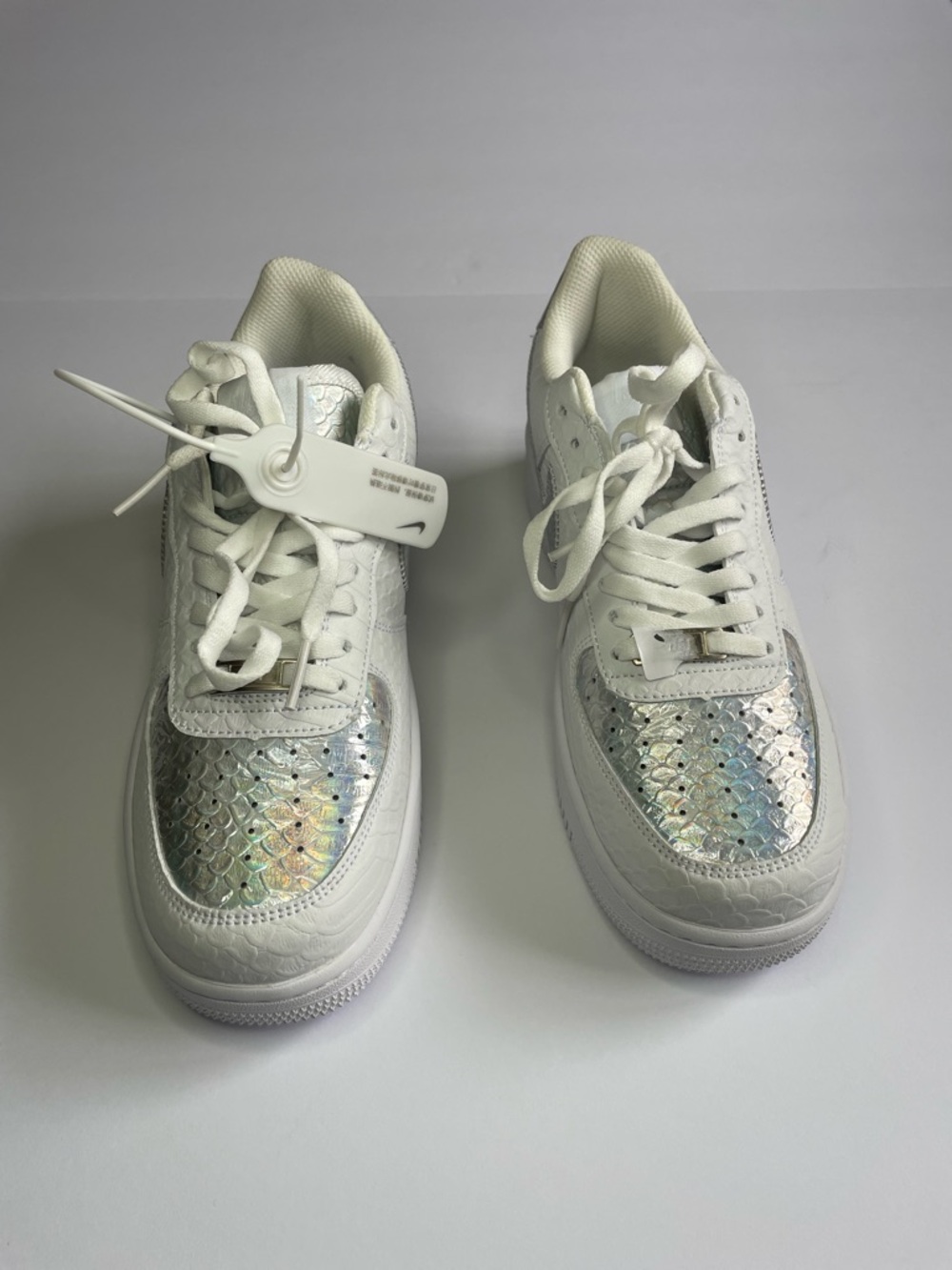 Nike Kids White Sneakers with Iridescent Scale Toe